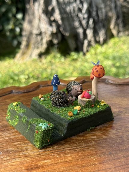 Phone Stand with Hedgehog Mother and Her Little Ones